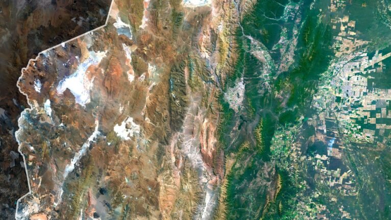 Satellite view of Argentina highlighting the Andes mountains and Pampas plains.