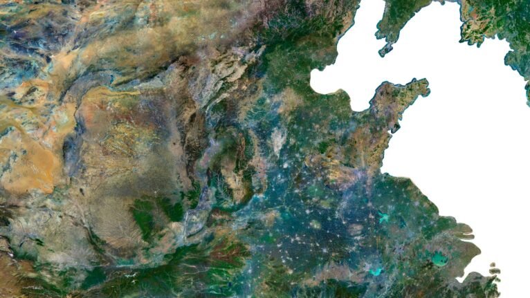 Satellite view of Asia used in aerial mapping and land use analysis, covering rural and urban areas.