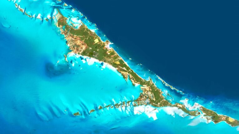 Satellite view of the Bahamas highlighting pristine beaches and vibrant coral reefs.