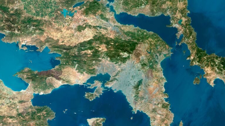 Decorative piece featuring a satellite map of Greece’s natural landscapes.