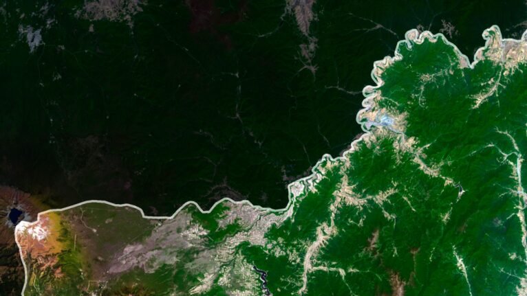 Satellite view of North Korea highlighting mountain ranges and coastal areas.