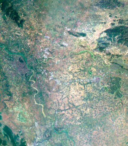 Vietnam satellite view highlighting coastal areas and inland landscapes.