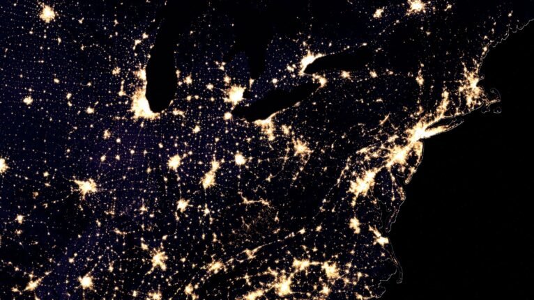 Detailed satellite imagery of the United States at night, highlighting urban areas and regional light pollution.